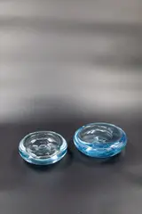 Per Lütken for Holmegaard, Two blue tinted blown glass bowls
