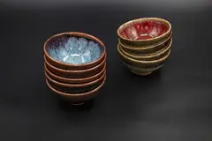George Sempagala, Two matching sets of nine stoneware rice bowls