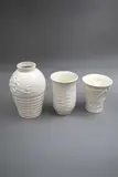 Three matt white vases by Crown Lynn Potteries, sold Feb 2023