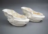A pair of white crag-shaped vases by Crown Lynn Potteries, sold Feb 2023
