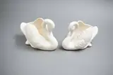A pair of small white swans by Crown Lynn Potteries, sold Feb 2023