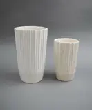 Tapering ribbed vase by Crown Lynn Potteries, sold Feb 2023