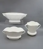 Three white ribbed mantle pieces by Crown Lynn Potteries, sold Feb 2023