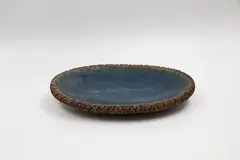 Flat oval platter by Doris Dutch, sold Oct 2022