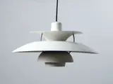 An original PH5 pendant lamp, 1958 by Poul Henningsen for Louis Poulsen, 1958, sold Oct 2022