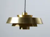 An original 1960s brass ‘Nova’ pendant lamp by Jo Hammerborg for Fog and Mørup, sold Oct 2022