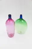 Two hand blown glass bottles by Ola and Marie Hoglund, sold Oct 2022