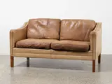 A Danish two-seater tan leather ‘2208’ sofa by Børge Mogensen for Fredericia, sold Oct 2022