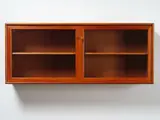 A glazed door wall cabinet or bookcase by Alf Svensson for Bjästa Möbelfabrik of Sweden, sold Oct 2022