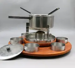 Original 1960s Scandinavian fondue set by Peter Holmblad for Stelton, sold Mar 2022