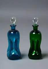 Jacob Bang for Holmegaard, Two vintage Kluk Kluk decanters with stoppers