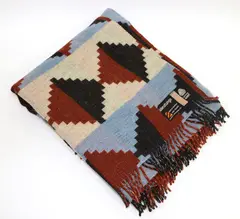 Travel rug by Manatunga, sold May 2021