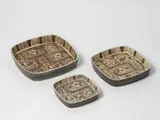 Three ceramic platters by Nils Thorsson for Royal Copenhagen, sold May 2021