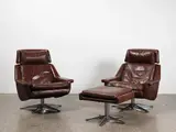 Werner Langenfeld, A pair of Esa leather ‘Modell 802’ lounge chairs together with one matching ottoman