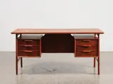 A teak ‘Model 75’ executive desk by Gunni Omann for Omann Jun Mobelfabrik, sold May 2021