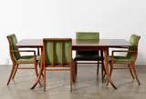 A sabre leg dining table by Terence Harold Robsjohn-Gibbings for Widdicomb, sold May 2021