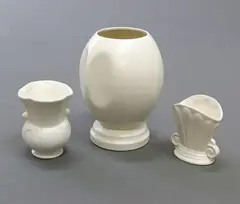 Two small white vases, possibly Titian Studio, and a Sylvac vase by Crown Lynn Potteries (attrib.) and Sylvac, sold Dec 2020