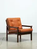 Illum Wikkelsø, A 1960s rosewood and leather armchair manufactured by Eilersen