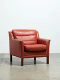 An original 1960s Cognac leather armchair by Mogens Hansen of Denmark, sold Feb 2020