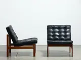 A pair of 1950s teak and leather modular Easy chairs by Ole Gjerlov-Knudsen and Torben Lind for Frances and Sons, sold Feb 2020