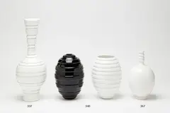 Two grooved vases by John Parker, offered Jul 2018
