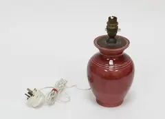 Red glazed lamp base by O.C Stephens, sold Jul 2018