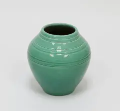 O.C Stephens, Green glazed ovoid vase