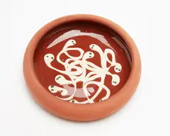 Early slip trailed pin dish by Len Castle, sold Feb 2018