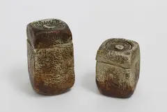 Two stoneware lidded boxes by Len Castle, offered Feb 2018