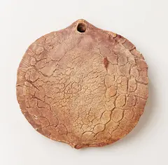 Stoneware discoid hanging form by Len Castle, sold Feb 2018