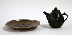 Estelle Martin, Large stoneware dish and a black glazed teapot