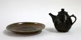 Estelle Martin, Large stoneware dish and a black glazed teapot