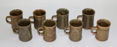 Temuka Pottery, Eight stoneware mugs