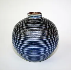 Len Castle, A good early salt glazed blue ribbed ovoid vase