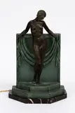 by Pierre Le Faquays (Fayral) by Art Deco patinated metal figural table lamp, sold Oct 2016