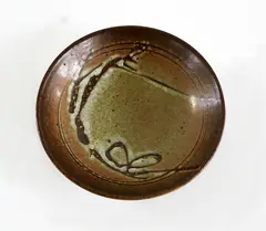 Small brown glazed bowl by Len Castle, sold Feb 2016