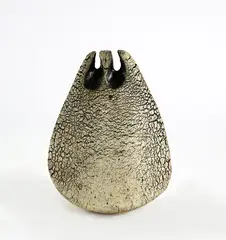 Double aperture sedge grass holder by Len Castle, sold Feb 2016