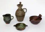 A stoneware oil bottle by Peter Stichbury, sold Sep 2015