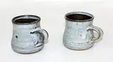 Pair of stoneware mugs by Len Castle, sold Sep 2015