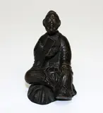 Small Chinese cast bronze scholar, 19th century