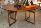 A large oak veneered drop side dining table by Peter Hvidt for France and Son, offered Feb 2015
