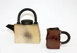 Peter Lange, Brick form teapot together with a small jug