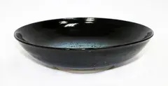 A good stoneware bowl by Len Castle, offered Feb 2015