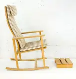 Rocking chair and matching footstool in oak, Circa 1950s by Borge Mogensen for Frederica furniture, offered Oct 2014