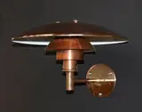 Pair of copper wall lights by Poul Henningsen for Louis Poulsen, sold Oct 2014