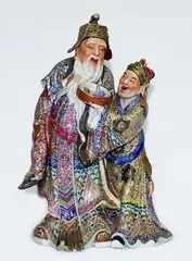 Large Chinese famille rose figure of an Immortal and attendant, 20th century