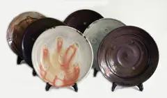 Six stoneware circular plates by Jason Hess [Usa], offered Oct 2013
