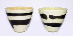 John Penman, Two matching large ivory cream and brown conical glass bowls