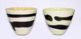 John Penman, Two matching large ivory cream and brown conical glass bowls