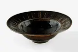 Michael Cardew, Stoneware dish with tenmoku glaze